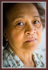 Distraught Senior Woman:  Protect seniors physically, emotionally, financially.