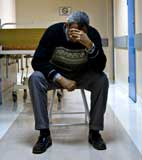 Distraught Elderly Man:  Elder abuse, neglect, fraud Arkansas resources.